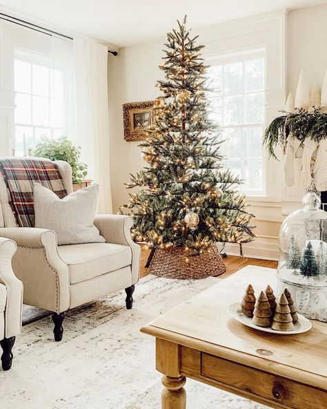 Kimberly on Instagram: “Hello friends! Hope thanksgiving was full of family, friends and lots of good food! Finishing up some Christmas decor here at home! Feeling…” Tree Collar Ideas, Taupe Living Room, Collar Ideas, Warm Wood Flooring, Grey Walls Living Room, White Mantel, Tall Christmas Trees, Gold Christmas Tree Decorations, White Armchair