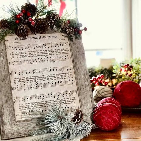 Song Sheet Crafts, Christmas Song Decor, Diy Sheet Music Crafts, Framed Hymnal Pages, Sheet Music Christmas Crafts, Christmas Sheet Music Decor, Vintage Sheet Music Crafts, Christmas Music Decor, Christmas Music Crafts