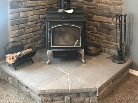 Hearth Pad Corner, Raised Wood Stove Hearth, Farmhouse Wood Stove Hearth, Stone Hearth Wood Stove, Wood Stove Surround Corner Stone Walls, Wood Burner Hearth Ideas, Diy Wood Stove Hearth, Wood Stove Tile Surround, Corner Hearth Ideas For Wood Stove