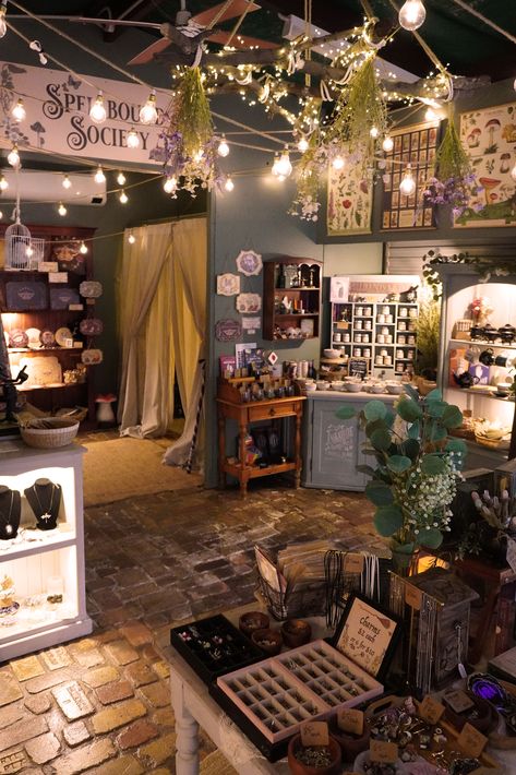 Witchy Shop Aesthetic. This is my Witchy Shop, full of witchcraft decor, woodland animals, divination tools, cottagecore gift ideas, hedge witch books and green witch gifts. Join me as the gifted cheye_psychic will be also here, offering tarot and mediumship readings every weekend. 🌟✨ Don't miss out on this incredible opportunity to gain insight and guidance. Book your spot now and let the magic unfold! ✨🔮⁠ ⁠ Open 7.30am-3pm carrara_markets Saturdays and Sundays⁠ Tea Shops Ideas, Cottagecore Witchy Aesthetic, Mystic Shop Aesthetic, Witchy Tea Shop, Spiritual Shop Ideas, Occult Shop Aesthetic, Witchy Craft Room, Witch Cafe Aesthetic, Witchy Shop Ideas