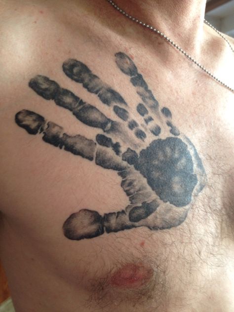 My husbands tattoo. It's of his handprint and our grandsons handprint. Handprint Tattoo Men, Hand Print Tattoo For Guys, Newborn Handprint Tattoo Ideas, Handprint Tattoo For Women, Handprint Tattoo Ideas, Imprint Tattoo, Baby Handprint Tattoo, Baby Tattoos For Dads, Grandson Tattoo Ideas