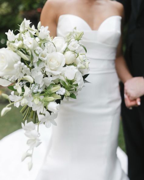 This wedding featured the brightest blooms and the sweetest bride and groom. 💞 We used a mix of white orchids, roses, peonies, campanula, and more to create this hand-tied and foam free cascading bouquet for our bride. The bridesmaids had smaller, standard versions of her bouquet. The whole day was just gorgeous! More to come… 🤍 Photography@brandisisson Planning: @hankalevents Venue: @sacredheartaugusta Floral Design: @honeycombflorals Beauty: @aklandco Catering: @berrys.catering Ren... Wedding Bouquets Peonies, Trailing Bouquet, Blush Bridal Bouquet, Cascading Bouquet, Peony Bouquet Wedding, Cascading Wedding Bouquets, Wedding Bouquets Bride, Roses Peonies, Cascade Bouquet