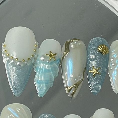 Press On Nails Australia | Custom Made To Order on Instagram: "It’s a beach day somewhere // OCEAN FANTASY SET 🌊☀️ Adore how refreshing this set is (Pictured Long Stiletto)   • •  #presson #pressonnails #naildesign #nailart #nailinspo #nailinspiration #nailtech #pressonnailbusiness #pressonsets #nailartist #nailsaustralia #stickonnails  #customnails #custompressonnails #miffynails #y2k #prettynails #cutenails #kessiistudio #customnails #custompresson #naildesigns #y2krings #sanrionails #coquettenails #bownails#3Djellygel #australiapressons #australianails #seashellnails #oceannails" Ocean Nails Designs, Seahorse Nails, Mermaidcore Nails, Sea Inspired Nails, Nails Australia, Ocean Nails, Seashell Nails, Cruise Nails, Beach Nail