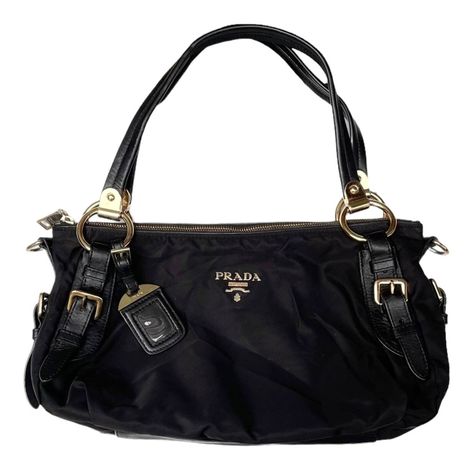 Prada Vintage - Nylon Satchel Bag Black  Good Conditions : 8/10 Made In Italy GHW This satchel features a nylon body with leather trim, rolled leather handles with belt details, a top zip closure, and interior zip and slip pockets. Measurements : Width : 14.5 inches Height : 9 inches Depth : 6.5 inches Hand Drop : 9 inches  Strap adjust  PLEASE CHECK ACTUAL SIZE CAREFULLY, NO RETURNS OR COMPLAIN FOR WRONG SIZE ACTUAL  *Shipping using Express Mail Service "will take 4 - 7 working day to arrived a Prada Bags Aesthetic, Vintage Bags Designer, Old Money Handbags, 90s Bags, Prada Vintage Bag, Vintage Prada Bag, Over Shoulder Bag, Prada Purse, Luxury Shoulder Bags