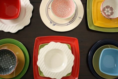 mismatched dishes strategy Mismatched Plates Table Setting, Mismatched Dinnerware, Floral Accent Chairs, Rainbow Plates, Picnic Baby Showers, Mismatched Dining Chairs, Mismatched Plates, Woven Dining Chairs, White Dinnerware Set