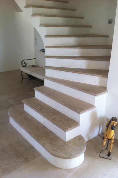 We manufacture and deliver all over France staircases in our natural stone from Burgundy. There are several ways to manufacture a staircase in Burgundy limestone.  > Fixing on a concrete support (treads + risers), The classic method for renovation or new houses A good tiler or mason is competent to carry out this type of layout.  > Spiral stairs (treads + risers) Gives our staircases an incomparable elegance and slenderness compared to the layout on concrete. Solid Staircase, Natural Stone Stairs, Limestone Stairs, Travertine Stairs, Stairs Treads, Staircase Spiral, Stairs Treads And Risers, Italian Style Home, Stone Staircase