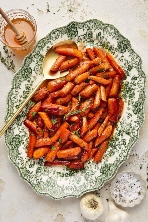 My maple-glazed carrots are a quick and easy side dish that my whole family loves! Perfect for weeknight dinners or a beautiful addition to your holiday table. With a mix of vegan butter, pure maple syrup (or honey), garlic, and fresh herbs, this easy recipe is a hit even with picky eaters! Aip Sides, Blackened Chicken Recipe, Glazed Carrots Recipe, Maple Glazed Carrots, Southern Greens, Dairy Free Cream Cheese, Christmas Meal, Carrots Recipe, Thanksgiving 2024