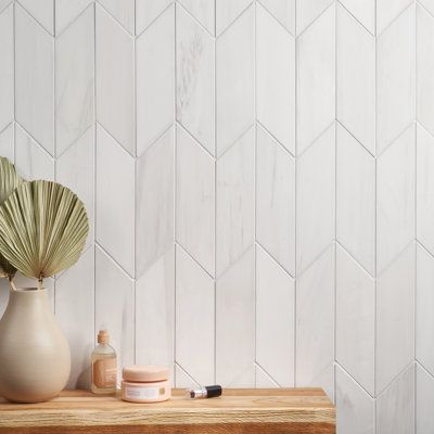 Embrace the elegance of imported Turkish design with this versatile subway tile. Perfect for walls or floors, its classic white blends seamlessly with any decor. Create a timeless backdrop for your next design project! | Bond Tile Bianco Dolomite 3 In. X 12 In. Honed Marble Floor & Wall Tile (4.94 Sq. Ft. / Case) brown / in White | Wayfair Honed Marble Floor, Backsplash Herringbone, Chevron Backsplash, Honed Marble Tiles, Affordable Tile, Chevron Tile, White Tile Backsplash, Herringbone Backsplash, Kitchen Backsplash Designs