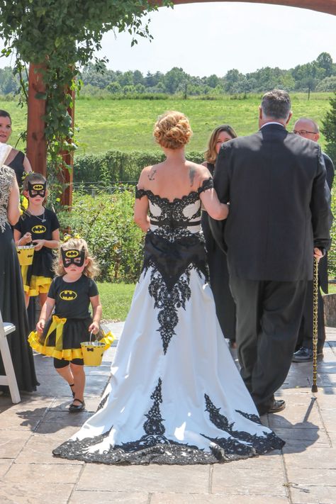 Batman Inspired Wedding Dress | Black and White Wedding Dress | Batman Themed Wedding | Cute Flower Girls #weddingdress #weddingideas #weddinginspiration #blackweddingdresses Batman Wedding Dress, Batman Wedding Theme, Wedding Dress Black And White, Elegant Sheath Wedding Dress, Black And White Wedding Dress, Batman Wedding, Inspired Wedding Dress, Wedding Dress Black, Batman Inspired