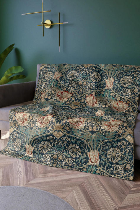 Wrap yourself in the historical splendor of the William Morris Honeysuckle and Tulip pattern with our sumptuous crushed velvet blanket. Celebrating one of the most influential figures in the Arts and Crafts Movement, this blanket brings Morris's vision of intertwined nature and exquisite craftsmanship right into the heart of your home. The Honeysuckle and Tulip pattern, cherished for its intricate beauty and botanical elegance, is delicately laid out on this plush blanket. William Morris Bedding Duvet Covers, William Morris Honeysuckle And Tulip, Designer Throw Blanket, Tulip Pillow, William Morris Golden Lily Fabric, William Morris Linen Fabric, Morris & Co Wallpaper House And Garden, Velvet Blanket, Designer Throws