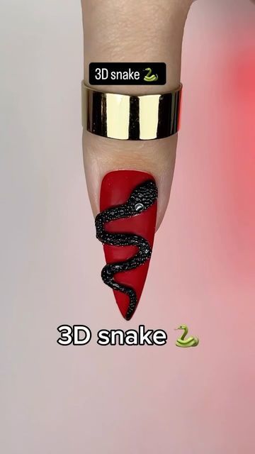 Nail art 💅 Manicure on Instagram: "Creator @anastasiia.nails.nl - Long red nails with a matte finish♥️, topped with an impressive 3D black snake.🐍 The snake is created using a top coat, covered with special foam, and then cured.🧼
This technique gives the nails a unique texture, resembling snake skin.🐍
A perfect choice for those who love bold and unusual manicures with attention to detail.🥰

Would you get nails like these?👇🏼✍️

#3Dsnakenails #halloweennails #redsnnakenails #3Dnailart #snakenaildesign #halloweennailart #spookynails #3Dhalloweennails #rednails #snakehalloweenmanicure #nailartinspo #nailsofinstagram #snakeinspirednails #eleganthalloweennails #red3Dnails #nailartdaily #fallnails #spookynailart #nailartideas #luxurynails #snakehalloweennailart #nailfashion #halloweenmanic Snake Art Nails, Nail Art Snake Design, Snake Nail Art Tutorials, Snake On Nails, Snake Skin Nails Designs, Snake Nails Designs, Snake Nails, Snake Skin Nails, Long Red Nails