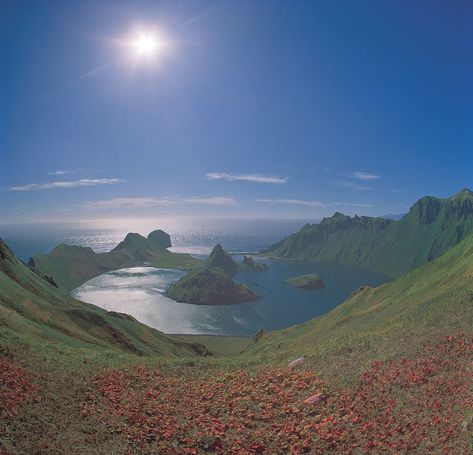 The summit of a partially submerged volcano forms the outline of Kraternaya Bay, Yankich Island, in the Kuril Islands of Russia. Kuril Islands, Union Of South Africa, Polynesian Islands, Southern Africa, Natural Phenomena, Archipelago, Pacific Ocean, Great Britain, Beautiful Landscapes