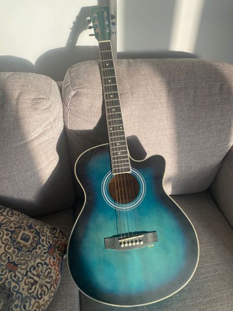 Cool blue and black acoustic guitar! #guitar #acoustic #blue #black #sunlight #trending #aesthetic Guitar Designs Acoustic, Blue Acoustic Guitar Aesthetic, Gutair Acoustic, Pretty Acoustic Guitars, Guitar Acoustic Aesthetic, Cool Acoustic Guitars, Cute Acoustic Guitar, Guitar Aesthetic Acoustic, Blue Guitar Aesthetic