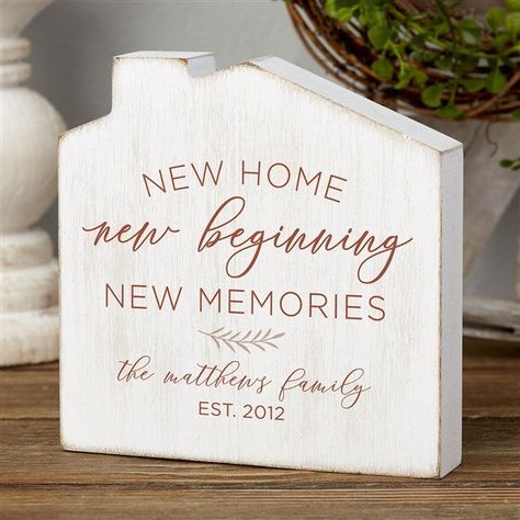 Personalize with any text below the phrase, "New Home New Beginning New Memories"Choose color For indoor use onlyDesign is printed on the front and may have a distressed beveled edgeBack and sides are painted white with distressed texture and edges100% MDFWipe cleanMeasures 5" x 5" x 1.75"Free standingImported Decorate a shelf or mantel in your home with the New Home, New Memories Personalized House Shelf Block. Perfect for welcoming guests or as a gift to friends or family purchasing a new home Mortgage Ads, New House Gift Ideas, Housewarming Gift Ideas First Home, Camping Signs Diy, Decorate A Shelf, New Home Gift Ideas, Welcome To Your New Home, Board And Brush, New House Announcement