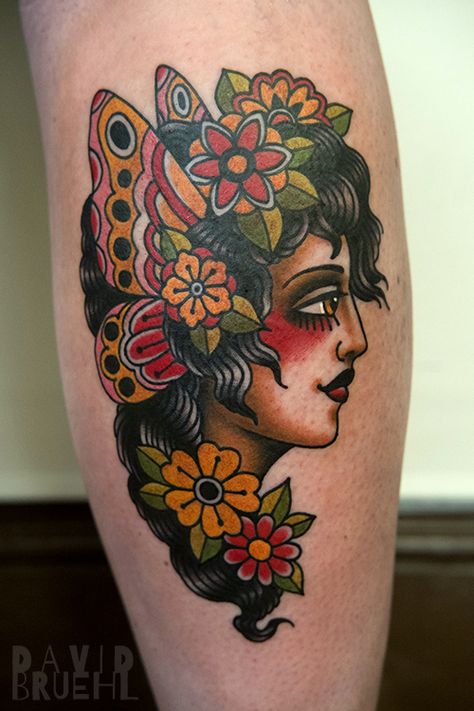 Tradtional tattoo of a woman's face with butterfly wings and flowers on a leg. By David Bruehl at RedLetter1 in Tampa, Florida Butterfly Lady Tattoo, Butterfly Woman Tattoo, Traditional Tattoo Face, Tattoo Woman Face, Traditional Tattoo Woman Face, Trad Sleeve, Face With Butterfly, Flower Tats, Traditional Tattoo Woman