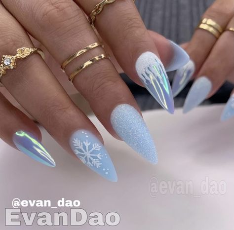 Nail Inspiration Stilleto, Stilleto Nails Designs Winter, Snowflake Nails Acrylic Almond, Blue Winter Nail Designs Almond, January Acrylic Nail Ideas, Blue Chrome Snowflake Nails, Snowflake Stiletto Nails, Winter Nails Acrylic, Her Nails