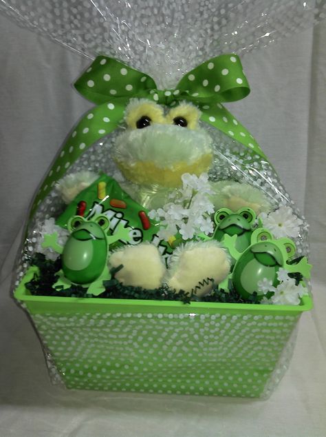 This basket was based on a frog theme. As you see there is a frog stuffed animal and other fun filled frog items, along with select candy items. Frog Gift Basket, Frog Themed Gifts, Frog Items, Frog Stuffed Animal, Best Gift Baskets, Frog Theme, Gift Tray, Frog Gifts, Themed Gift Baskets