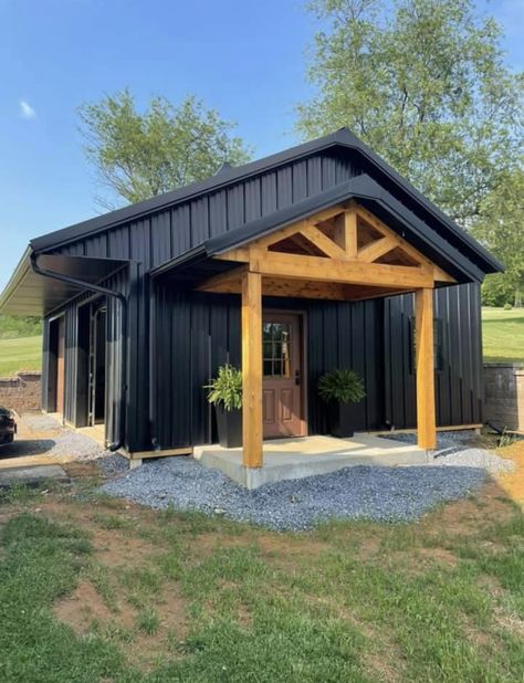 Small Shed Cabin Ideas, Metal Siding Shed, Small Black Metal House, Black Metal Building With Cedar, Black Metal Commercial Building, Simple Black Barndominium, Small Garage Ideas Exterior, Black Shed With Wood Accents, Navy Metal House