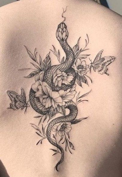 Snake Tattoos Flower, Rattlesnake Tattoo Feminine, Back Snake Tattoo Women, Back Tattoos Snake, Snake Tattoo Spine, Snake Tattoo With Flowers, Snake Tattoo Feminine, Snake Floral Tattoo, Chest Tats For Women