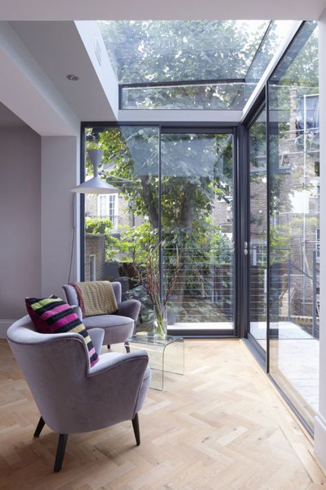 34 Stunning Glass Extension Ideas For Maximize Natural Light | HomeMydesign Small Conservatory Interiors, Glass Room Extension, Glass Wall Design, Conservatory Interior, Glass Conservatory, Garden Room Extensions, London Townhouse, Room Extensions, Glass Extension