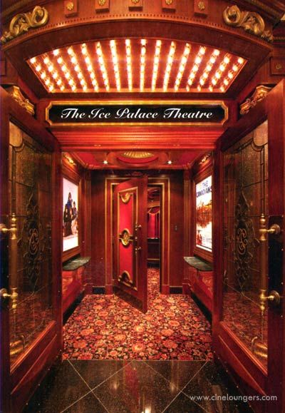 Theater Entrance - The suspense builds as guests enter the First Impressions home theatre from the lobby and “light trap” hall.                                                                          And on the lowest level, the real fun begins. Created by master home-theatre architect and designer Jeffrey Smith, claret walls and gold leafed Corinthian columns turn the downstairs into La Scala. “Actually, the entire theatre is a room within a room,” Smith says. Theater Entrance, Grand Mansion, Florida Interior Design, Homes Of The Rich, Real Estate Blog, Lush Forest, South Florida, Luxury Real Estate, Home Theater