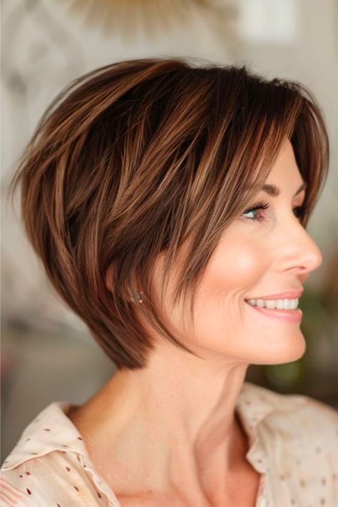 A little longer than a traditional pixie, this blend of a pixie and a bob is cut on an angle to create a flattering shape. Soft layers allow for versatile styling. Click here to see more stunning pixie hairstyles for women over 40. Layered Pixie Bob, Longer Pixie Haircut, Pixie Bob Haircut, A Bob, Soft Layers, Haircuts For Curly Hair, Bob Hairstyles For Fine Hair, Hair Advice, Great Hairstyles