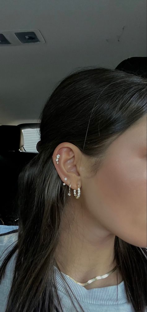 minimalist jewelry, aesthetic, gold hoops, cartilage earring, drop hoop earring, gold jewelry, gold necklace Multiple Hoop Earrings Aesthetic, Good Hoops Aesthetic, Minimal Earrings Aesthetic, Gold Ear Piercings Aesthetic, Nose Ring Aesthetic, Gold Hoop Earrings Aesthetic, Multiple Hoop Earrings, Gold Earrings Aesthetic, Ušný Piercing