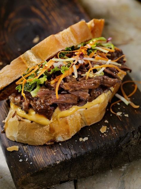 Braised Beef Short Rib Sandwich with Pickled Veggies Short Rib Sandwich Recipe, Braised Beef Sandwich, Short Rib Sandwich, Veggies Roasted, Vietnamese Banh Mi, Garlic Mayonnaise, Rib Sandwich, Dinner Sandwich, Steak Sandwich Recipes