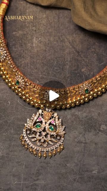 Aabharanam Jewellers on Instagram: "Every detail of this choker is crafted to perfection – from the meticulously designed gold band featuring an angular motif and the multi-layered bead border to the opulent pendant adorned with a Lakshmi Devi motif and radiant gemstone accents. A true masterpiece of South Indian jewelry craftsmanship.

#aabharanamjewellers

#SouthIndianJewelry #HeritageJewels #GoldChoker #TraditionalJewelry #LakshmiPendant #FineCraftsmanship #TimelessElegance #DiamondJewellery #BridalJewellery #WeddingJewellery #BridesOfHyderabad" Lakshmi Devi Pendants Gold, Pendants Gold, Lakshmi Devi, South Indian Jewelry, Gold Jewelry Indian, Gold Choker, Jewelry Indian, Traditional Jewelry, Gold Band