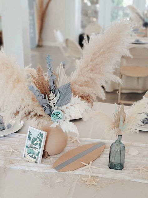 Baby on Board Baby Shower | CatchMyParty.com Baby On Board Centerpieces, Surfboard Centerpiece Ideas, Boho Beach Baby Shower Ideas, Surfer Boy Baby Shower Ideas, Beach Themed Baby Shower Ideas, Beach Baby Shower Ideas, Surfer Baby Shower Ideas, Beach Theme Baby Shower Ideas, Baby On Board Shower Theme