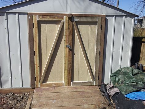 This large metal shed had rickety metal doors that were bent, falling off and useless. The home owner wanted to see if I could put wood doors on it to match another wood shed he had. He was going t… Metal Shed Door Ideas, Tin Shed Makeover, Shed Doors Designs, Shed Doors Diy, Metal Shed Ideas, Shed Door Ideas, Backyard Shed Ideas, Bookcase Redo, Shed Makeover