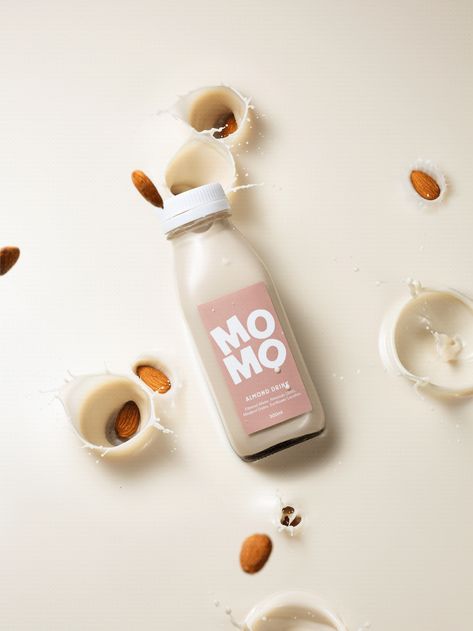 MOMO on Behance Almond Milk Drinks, Almond Drink, Nut Jar, Sweet Packaging, Milk Packaging, Drink Packaging, Yogurt Drinks, Bottle Design Packaging, Glass Milk Bottles