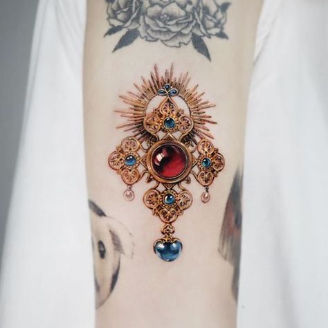 Tattoo uploaded by Justine Morrow • Gold and gem tattoo by Mumi Ink #MumiInk #gold #gems #jewels #filigree #realism #ornamental • 1280357 • Tattoodo Gold Tattoo Ink, Jewelry Tattoo Designs, Colorful Sleeve Tattoos, Hyper Realistic Tattoo, Gem Tattoo, Jewel Tattoo, Gold Tattoo, Amazing Tattoos, Jewelry Tattoo