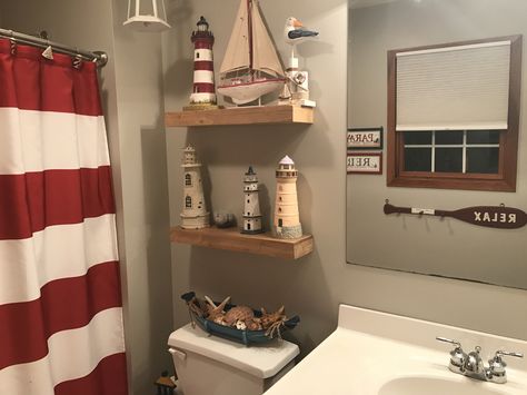 Lighthouse theme in bathroom. Nortical Theme Bathroom, Light House Bathroom Theme, Nautical Theme Bathroom Ideas, Lighthouse Bedroom Ideas, Lighthouse Theme Bathroom, Lighthouse Bathroom Ideas, Pirate Theme Bathroom, Pirate Themed Bathroom, Lighthouse Decor Ideas