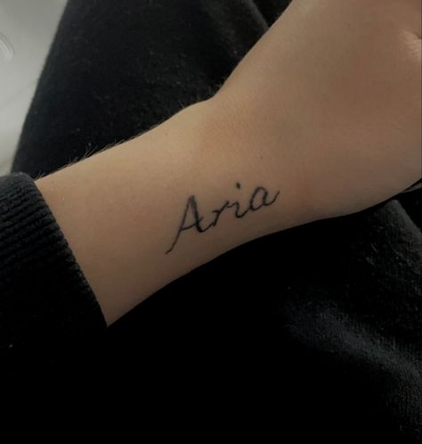 aria tattoo simple name hand aesthetic Aria Name Tattoo, Aria Tattoo Ideas, Aria Tattoo Name, Aria Tattoo, Aria Name, Name Tattoo, Name Tattoos, Elegant Dresses Long, Dresses Long