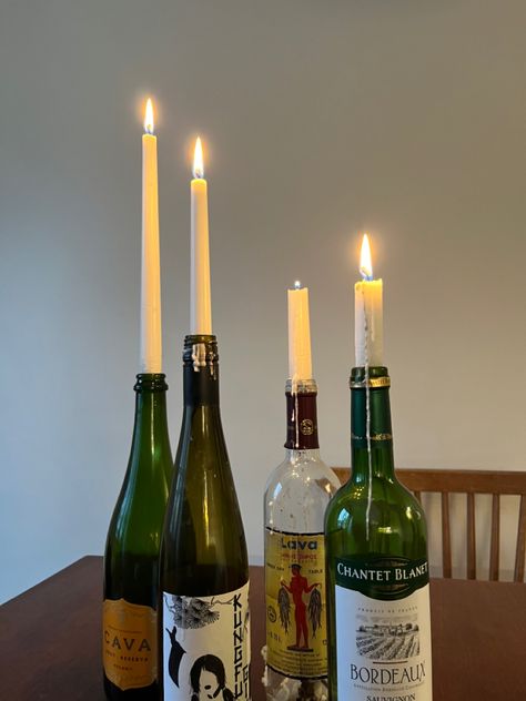 Bottles As Candle Holders, Wine Bottle With Candle Stick, Taper Candle Wine Bottle, Wine Bottle Taper Candle Holders, Candles In Glass Bottles, Wine Bottles As Candle Holders, Vine Bottle Decoration, Wine Bottle As Vase, Winebottle Candleholder Aesthetic