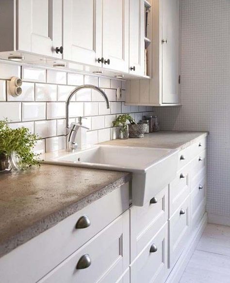 40 Amazing and stylish kitchens with concrete countertops... LOVE and WANT a farmhouse sink and concrete counters!!!!! Kitchens With Concrete Countertops, Kitchen With White Cabinets, Farmhouse Kitchen Backsplash, Kitchen Remodel Countertops, Kitchen Ikea, Kitchen Ideals, Concrete Countertops Kitchen, Kabinet Dapur, Kitchen Backsplash Designs