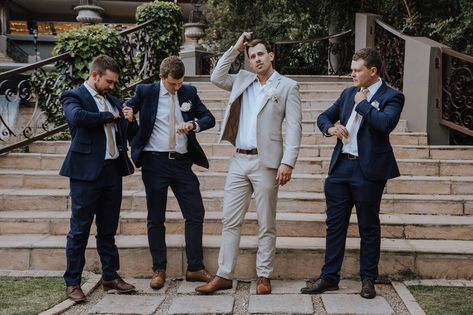 Tan Groom Navy Groomsmen, Beige Groom Navy Groomsmen, Groom Tan Suit Groomsmen Navy, Groomsman Color Scheme, Navy Blue And Tan Groomsmen Suits, Blue And Brown Groomsmen, Midnight Blue Suit Wedding, Groom In Different Suit Than Groomsmen, Groomsmen Attire Navy Blue