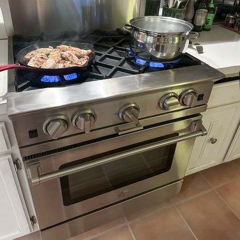 Colors to make a statement and stainless for a classic look. Claire, from our Hyannis sales team, shows off her home's @bluestarcooking gas range with open burners. She loves the control it gives her when cooking, especially for stir fry, and says it's a work horse! Ask us about cooking with BlueStar and how you can customize colors to create the kitchen of your dreams! Cook In Kitchen, Cooking In Kitchen, Kayley Cuoco, Brick Oven, Gas Cooker, Aesthetic Kitchen, Samsung Products, Kitchen Stove, Baked Donuts