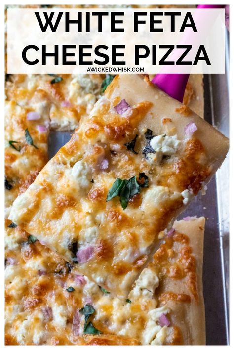 White Feta Cheese Pizza is easy to make, bursting with garlic flavor and ready to eat in just 30 minutes! Made with store-bought pizza dough, shredded mozzarella cheese, tons of garlic and  feta cheese, this white pizza recipe (also known as pizza bianca) is super simple to make and the perfect easy pizza recipe for weeknight dinners. #whitepizza #whitepizzarecipes #fetapizza #fetacheesepizza #garlicpizza #whitegarlicpizza #bestwhitepizzarecipe Feta Cheese Pizza, White Pizza Recipe, Feta Pizza, White Pizza Recipes, Yummy Pizza, Pizza Bianca, White Pizza, Pizza Recipes Easy, Pizza Recipes Homemade