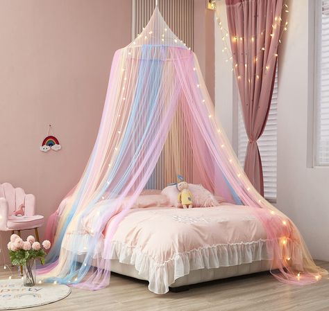 PRICES MAY VARY. Package Include:1 x Bed Canopy + 1 x Lights,height- 90”,net circumference-402” Rainbow Bed Canopy:Our bed canopy is a unique design with pink blue purple pastel color pattern.The rainbow color will brighten up your kids’ bedroom with colorful fun. Canopy For Girls Room Decor: Beautiful Rainbow Decor For Kids room decor, toddler room decor for girls, girls bedroom decor,will let your kid enjoy enough sleep with peace for the kids' sleep health. Easy To Use:All the installation ac Bed Canopy With Lights, Rainbow Bed, Princess Canopy Bed, Rainbow Bedroom, Canopy Bed Curtains, Kids Canopy, Baby Canopy, King Sized Bedroom, Princess Bed