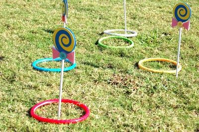 Then, we did a lollipop ring toss. I used my Cricut Expression to make these lollipops for the game. The rings were on major sale because they are just plastic pool toys from the summer! Here are some pictures of the game- I think the kids had fun with it! Shopkins Bday, Lollipop Ring, Willie Wonka, Lollipop Birthday, Willy Wonka Party, Candy Themed Party, Lollipop Party, Candy Land Birthday Party, Simple Birthday Party