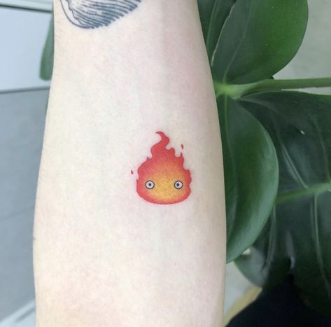 Powerful Small Tattoos, Mighty Tattoo, Small Tattoos Minimalist, Tattoo Ideas Tiny, Calcifer Tattoo, Tiny Tattoos With Meaning, Tatuaje Studio Ghibli, Small Geometric Tattoo, Tiny Wrist Tattoos