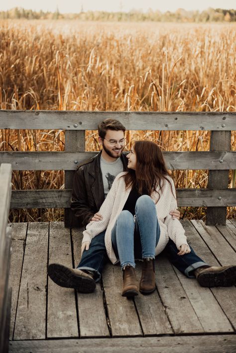 This dreamy fall photoshoot was on the boardwalk at the fink centre. This was dreamy location as well as a stunning couple with matching blundstones. Boardwalk Family Photoshoot, Couples Photoshoot On Dock, Boardwalk Photos, Boardwalk Photoshoot, Country Couple Poses, Couple Fall Photoshoot, Couple Photoshoot Ideas, Fall Couples, Des Couples