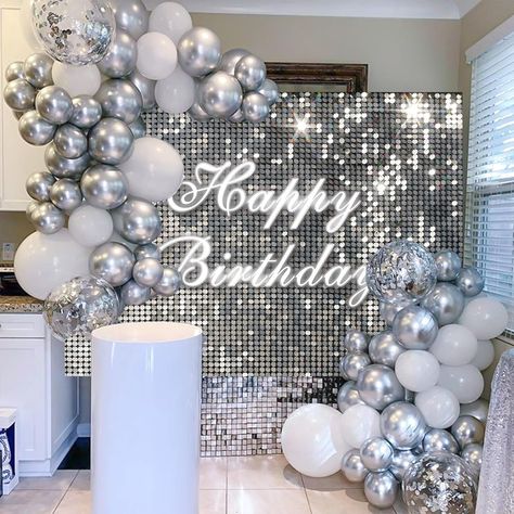 PRICES MAY VARY. 【Silver Sequin Birthday Decorations】Package included 1 pcs sliver glitter spots backdrop, 20 silver balloons, 20 white balloons, 10 silver sequin balloons, 1 roll of balloon chain, 1 roll of balloon dotting glue, 1 roll of balloon ribbon. 【Size and Material】This silver sequin backdrop size is 180x120cm/72x48inch, large enough to be used as a photography background. Latex balloons size is 12 inches, thick enough. Perfect for birthday parties for adults and children 【High Quality】 Silver And White Birthday Theme, Silver Backdrop With Balloons, Winter White Party Decorations, Birthday House Party Ideas Decoration, Gold And Silver Birthday Theme, White And Silver Decorations Party, Silver Prom Theme, Coastal Granddaughter Birthday Party, Winter 16th Birthday Party Ideas