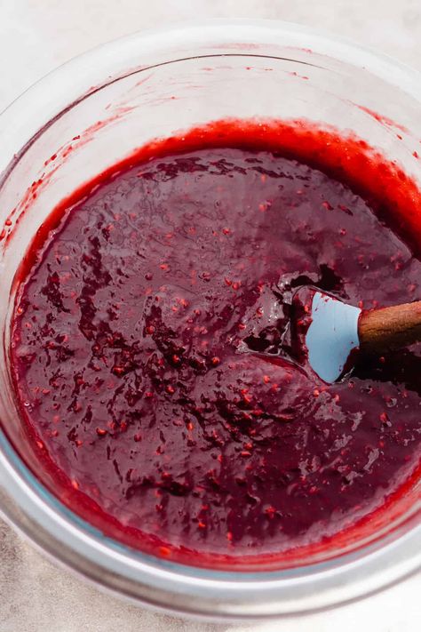 Raspberry Coulis comes together in 10 minutes with just 5 simple ingredients. This luscious raspberry dessert sauce is perfect for serving over ice cream, cheesecakes, or pound cake. Raspberry Drizzle, Raspberry Coulis Recipe, Raspberry Glaze For Cheesecake, Raspberry Sauce For Cheesecake, Coulis Recipe, Raspberry Coulis, Raspberry Desserts, Raspberry Sauce, Dessert Sauces