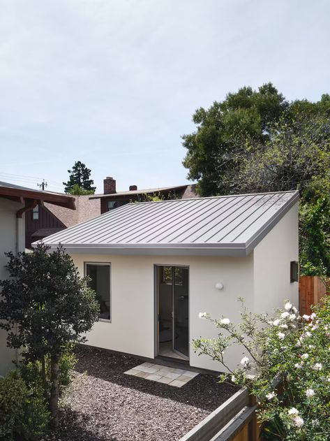 Budget Breakdown: Here’s What It Cost to Build Two ADUs on the Same Bay Area Block - Dwell Stucco Siding, Cost To Build, Siding Materials, Roofing Materials, Metal Roof, Bay Area, Open House, Roof, Budgeting