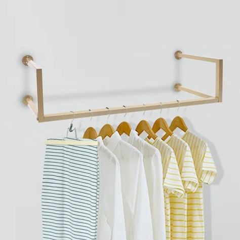 Williston Forge Jahmad 70.87" W Wall Mounted Clothes Rack | Wayfair Gold Clothing Rack Display, Wall Clothes Hanger, Clothing Display Rack, Rack Industrial, Clothing Display, Metal Clothes Rack, Clothes Hanging, Clothing Displays, Hanger Organizer