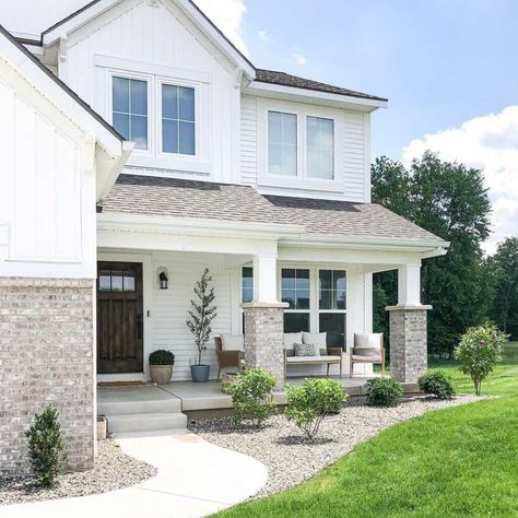 26 Porch Roof Ideas to Instantly Boost Curb Appeal White Home With White Windows, White House Light Gray Roof, Gray Brick White Siding, Tan House White Windows, White House With Gray Stone, White Brick House White Windows, White Siding White Windows, Tan And White House Exterior, White House With Brick Accents