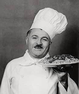 Chef Ettore Boiardi was born in Italy and came to America in 1914, at age 16. . He oversaw catering of President Woodrow Wilson's 1915 wedding. He was an entrepreneur and started selling his recipes under the name Chef Boyardee. Chef Boyardee, Rick Bayless, Spaghetti Meatballs, Franchise Food, Italian Chef, Spaghetti And Meatballs, People Eating, Celebrity Chefs, Authentic Italian